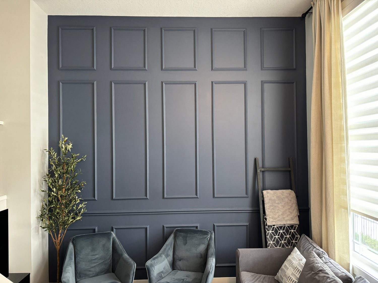 navy blue wall paneling living room